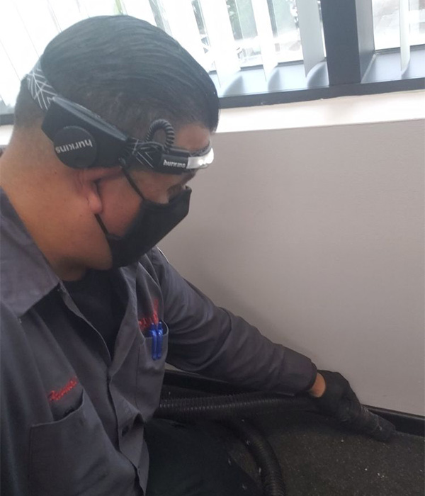 man vacuuming